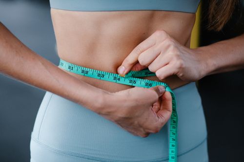 Woman checking her health and fitness progress